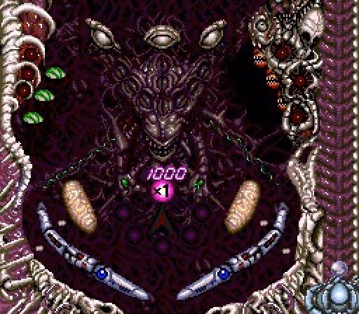Criaturas alienígenas sobre la mesa viva de Alien Crush